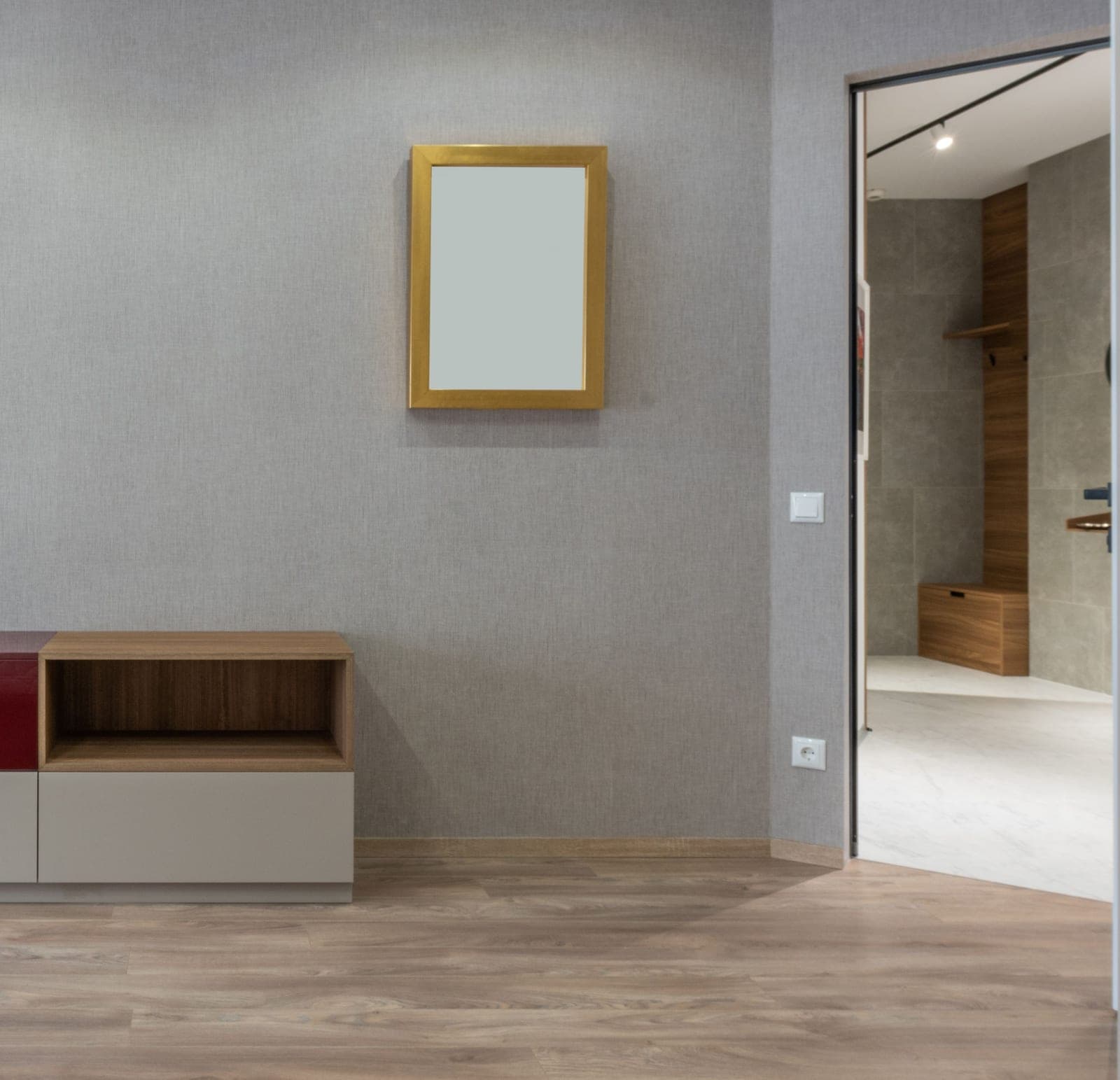 An empty modern room with a wooden floor