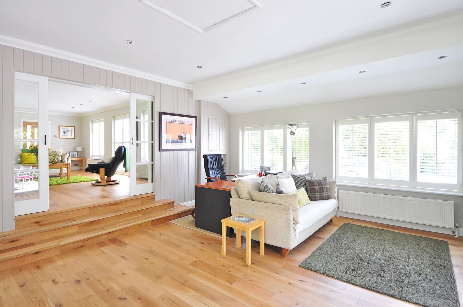 A bright living room with wooden floors and modern furniture