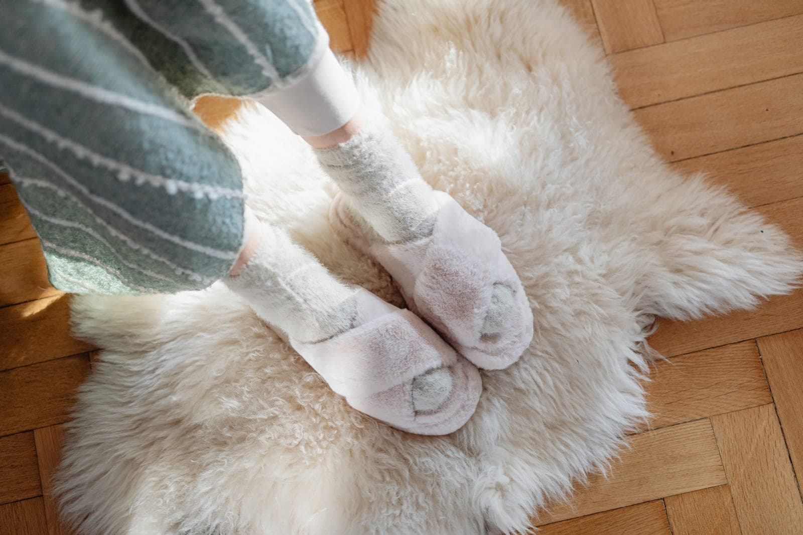 A wool rug on a wooden floor